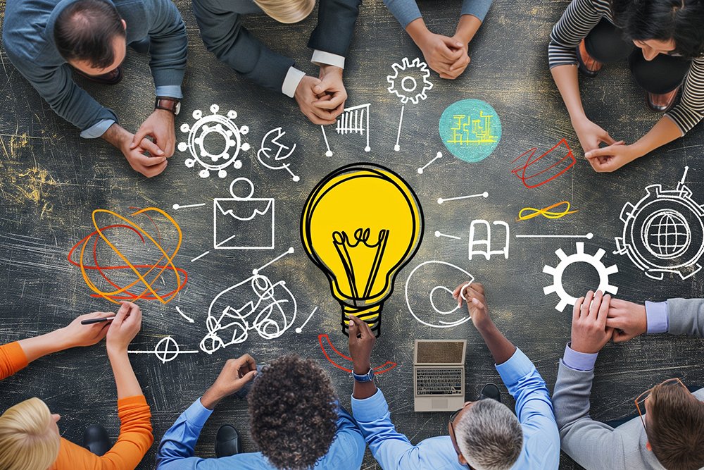 group of innovators brainstorming ideas for a disruptive technology